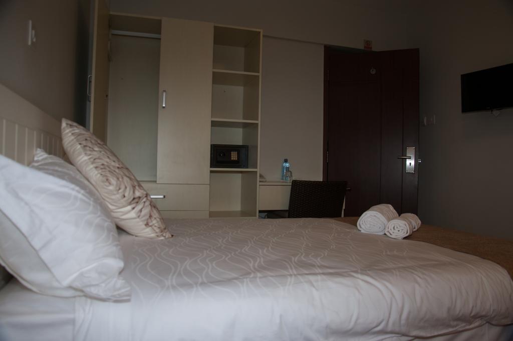 Eddy Suites, Emeli Hotel Найробі Номер фото