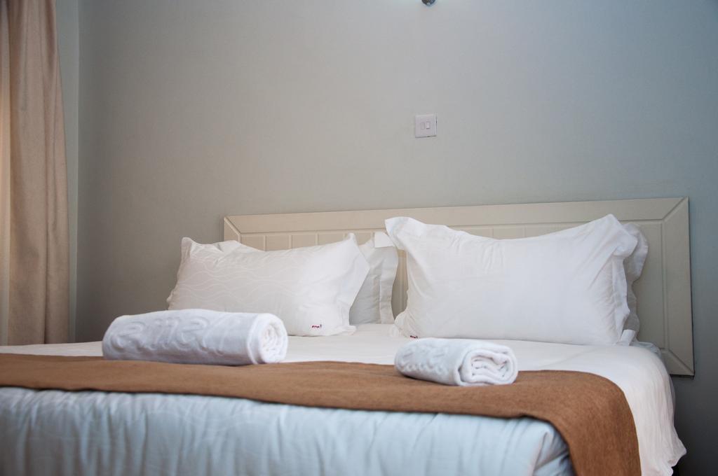Eddy Suites, Emeli Hotel Найробі Номер фото
